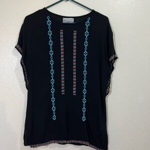 Pink Cadillac sleeveless black top with embroidery. Size Medium